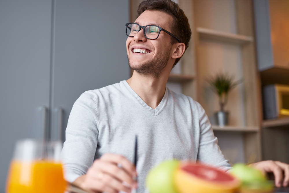 Smiling man with a confident, healthy smile from cosmetic dentistry serving patients in the Glenridge, NJ community